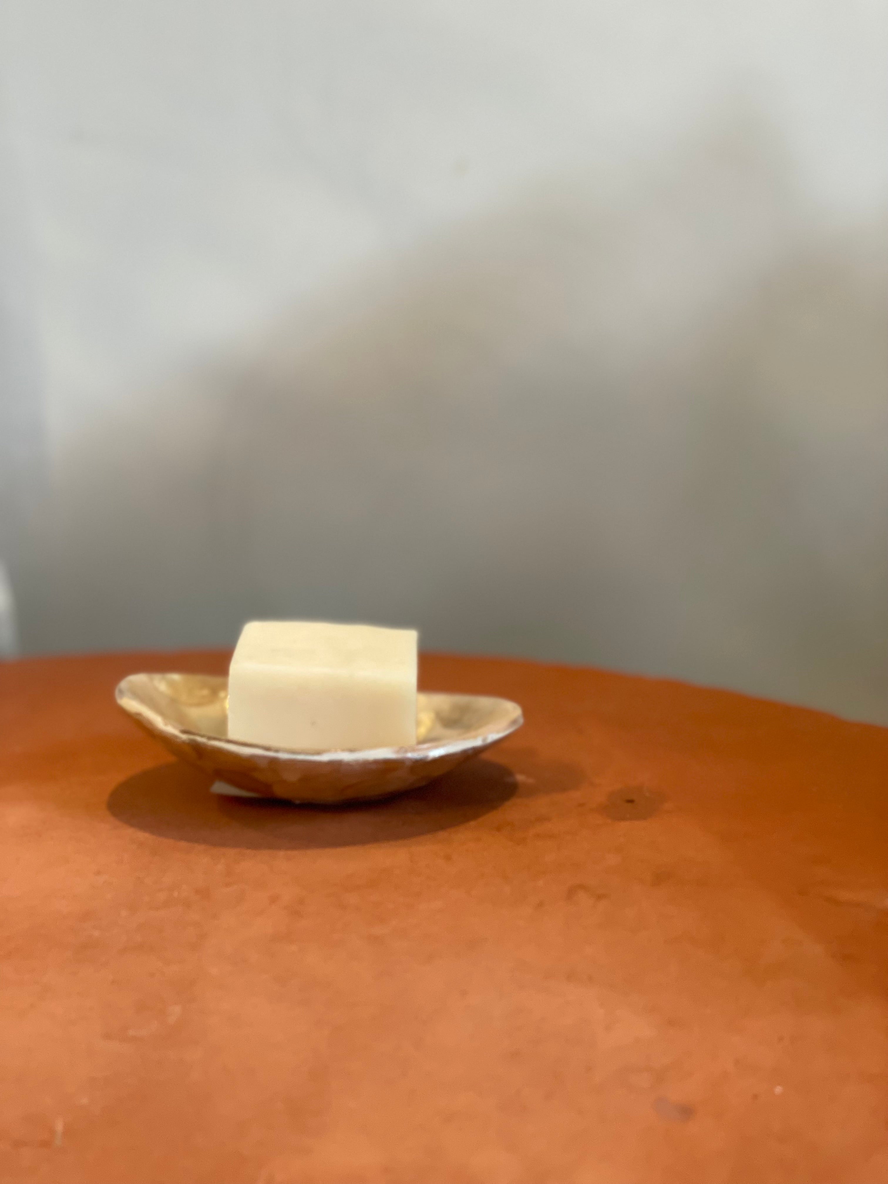 Oval resin bowl with Capiz shells