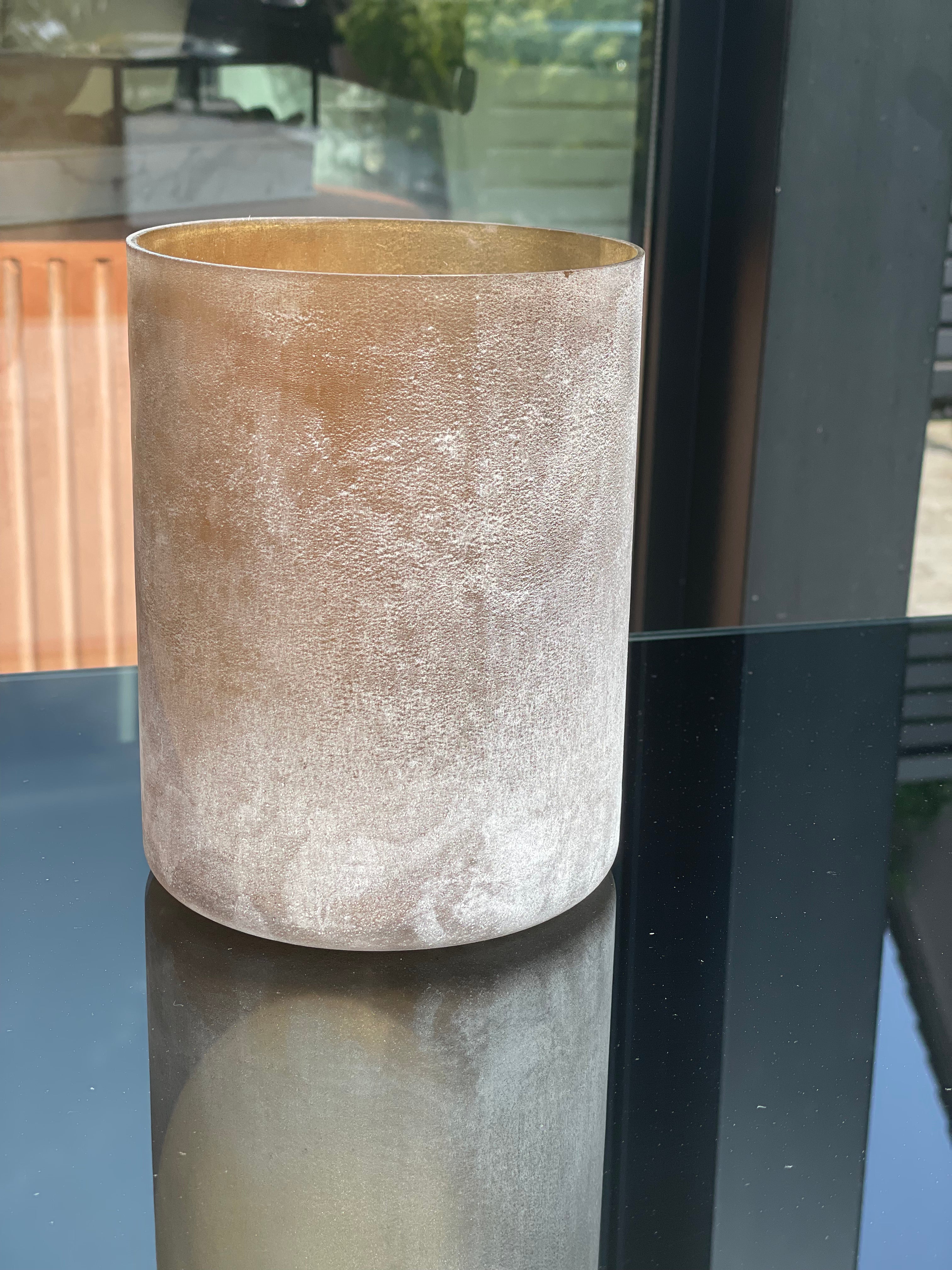 Candle holder in brown glass